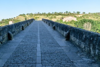 Crossing the pilgrim bridge (Queen's Bridge) on the way out of Puente la Reina