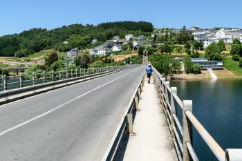 Crossing bridge into Portomarin